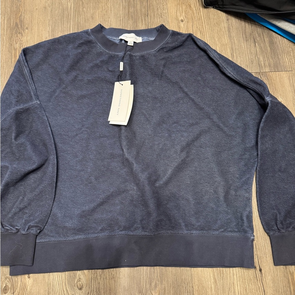 Something Navy sweatshirt. Navy blue. Towel type material.  New with tags.